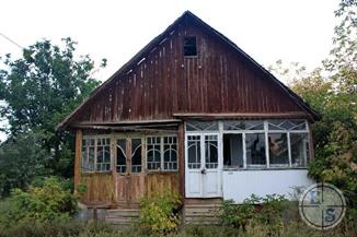 Черневцы, Винницкая обл. Два дома, объединенные под одной крышей, 2012 Черневцы, Винницкая обл. Два дома, объединенные под одной крышей, 2012