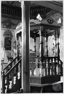The interior of the synagogue. Carved wooden bema (elevation on which the Torah is read)