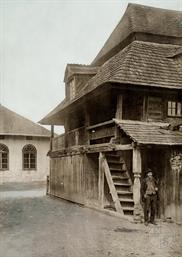 Synagogue, the beginning of the 20th century. Jew near the entrance to the women's gallery