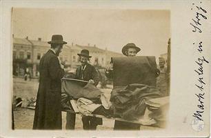 Jews buy fabric in the market in Stryy, 1916 Jews buy fabric in the market in Stryy, 1916