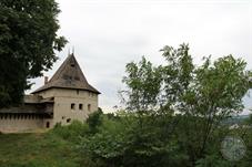 There are castle ruins on a high hill above the city. There are castle ruins on a high hill above the city.
