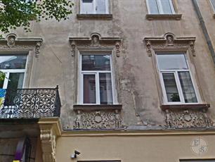 Маскароны и путти на доме Самуэля Галля. Фото Google Maps Маскароны и путти на доме Самуэля Галля. Фото Google Maps