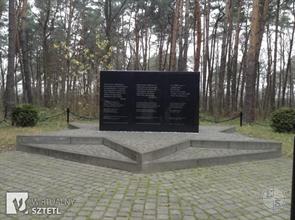 Memorial on the mass grave in the forest near the town Memorial on the mass grave in the forest near the town