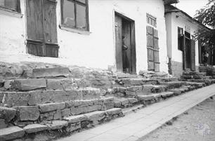 Jewish houses. A mezuzah is visible on the doors in background Jewish houses. A mezuzah is visible on the doors in background