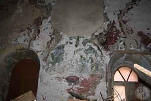 Traces of murals are visible under the rubble inside Traces of murals are visible under the rubble inside