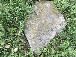 Fragments of matsevot in the destroyed Jewish cemetery, 2019 Fragments of matsevot in the destroyed Jewish cemetery, 2019