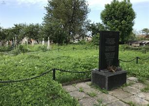 Memorial at the mass grave in the Christian cemetery Memorial at the mass grave in the Christian cemetery