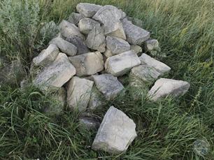 Fragments of tombstones in the Jewish cemetery in Yahilnytsia