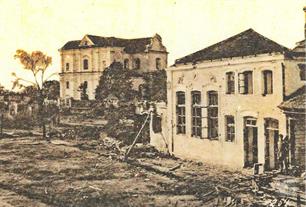 Fragment of the postcard. The star of David on the corner of the synagogue is visible Fragment of the postcard. The star of David on the corner of the synagogue is visible