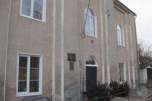 There is an information nameplate on the building There is an information nameplate on the building